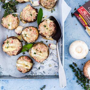 Mushrooms stuffed with hot cheese and ham