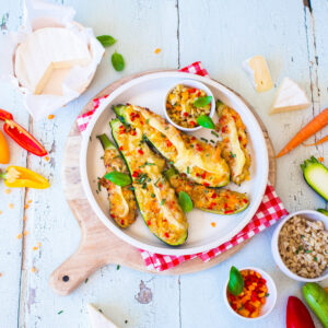 Courgettes stuffed with wheat, vegetables and From’Chaud